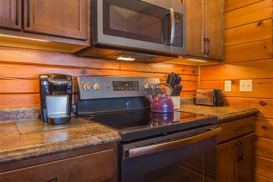 Traditional and Keurig coffee makers and a tea kettle for our tea drinkers