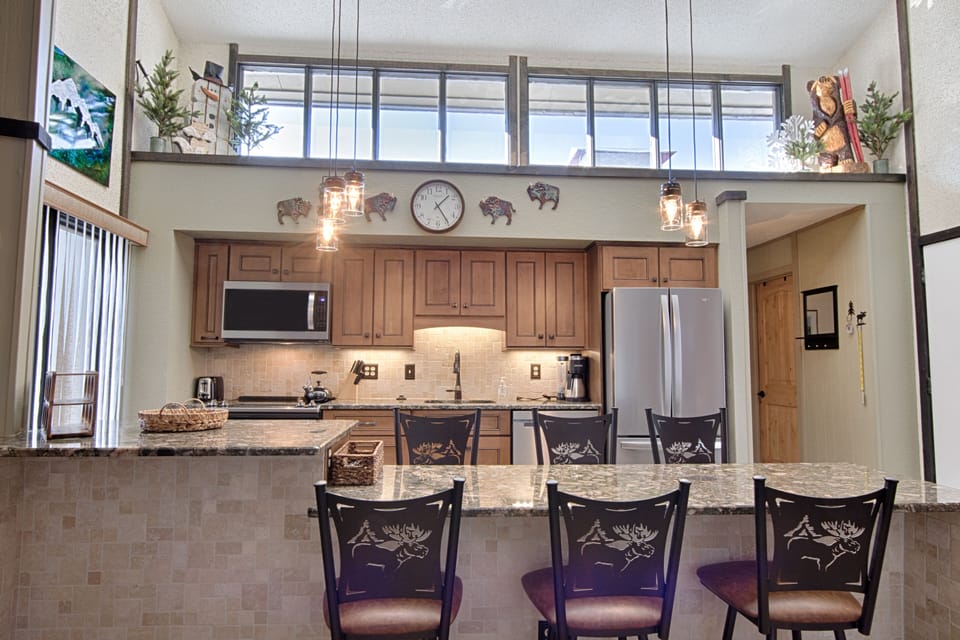 Udated & stocked kitchen. Sky lights provide a lot of natural light.