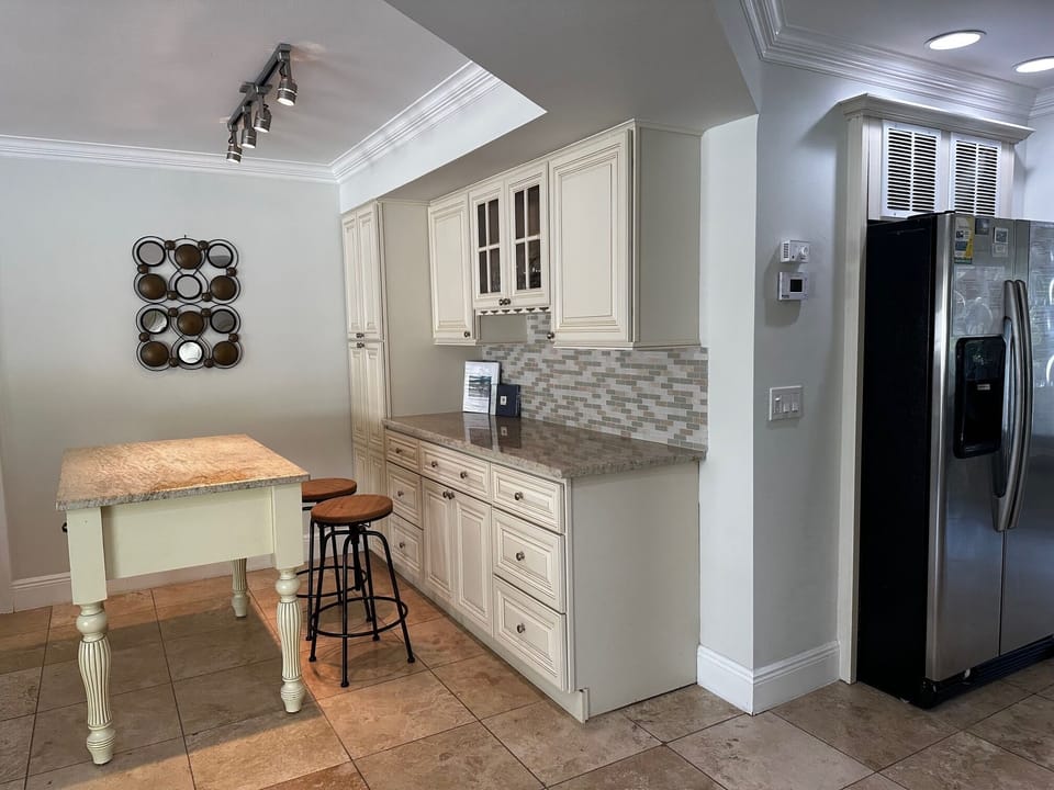 Plenty of Storage and Extra Island Seating