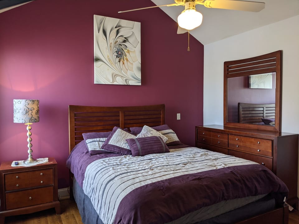 2nd Bedroom with Queen size bed, cathedral ceilings and a view