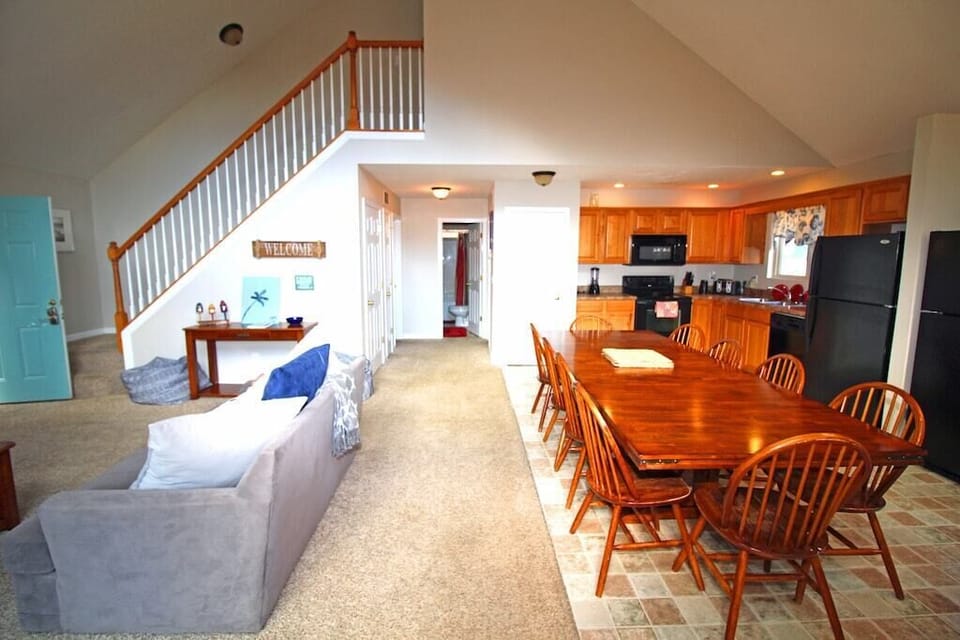 Open dining area with large dining room table