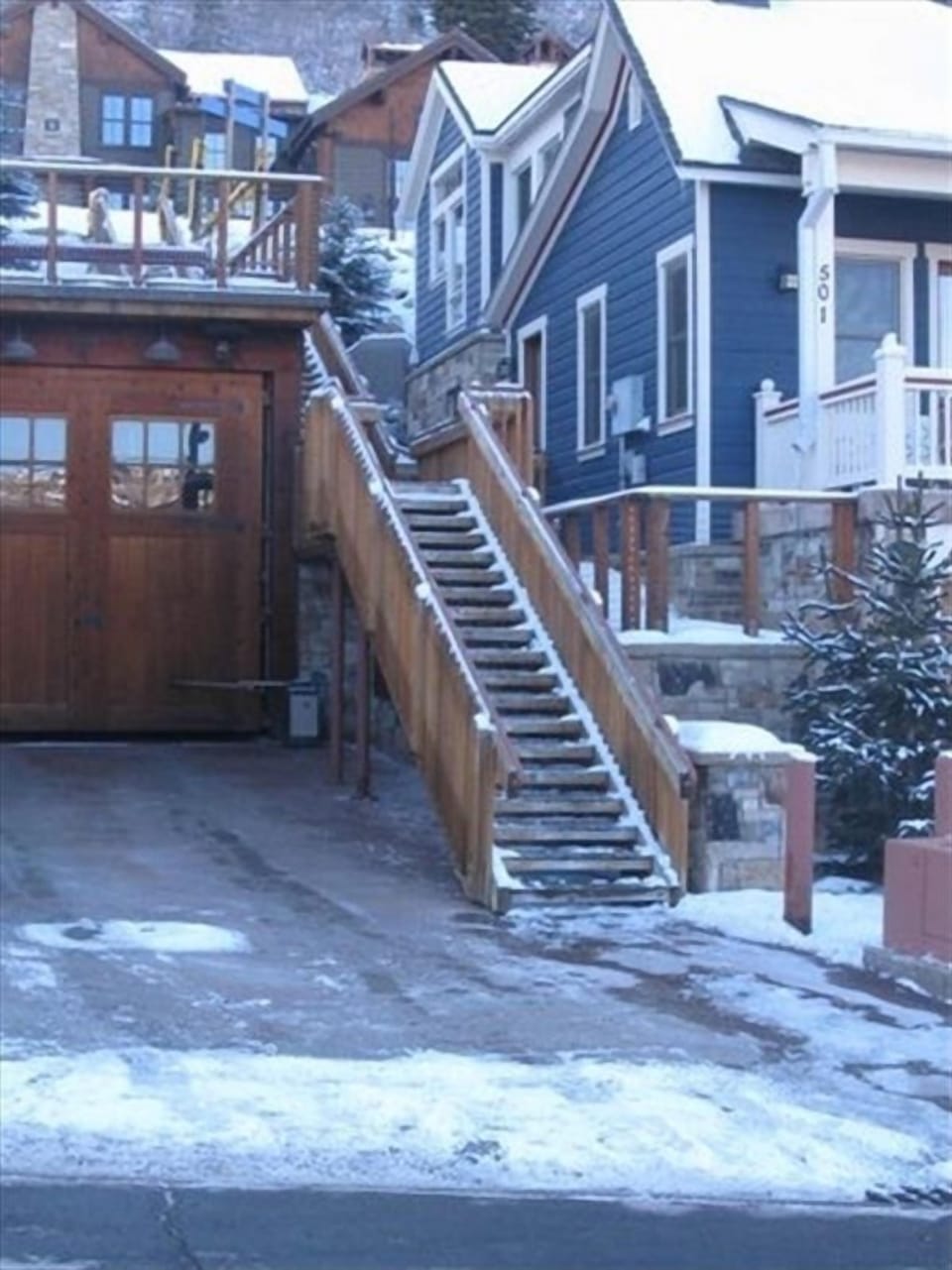 Stairs to "Quiting Time" from the front of condo unit.
