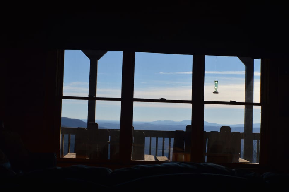 Enjoy views of the mountain from the comfort of the living room leather sofa.