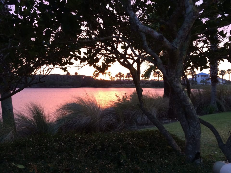 Sunset over the lake in the back yard from Oliver's Hideaway.