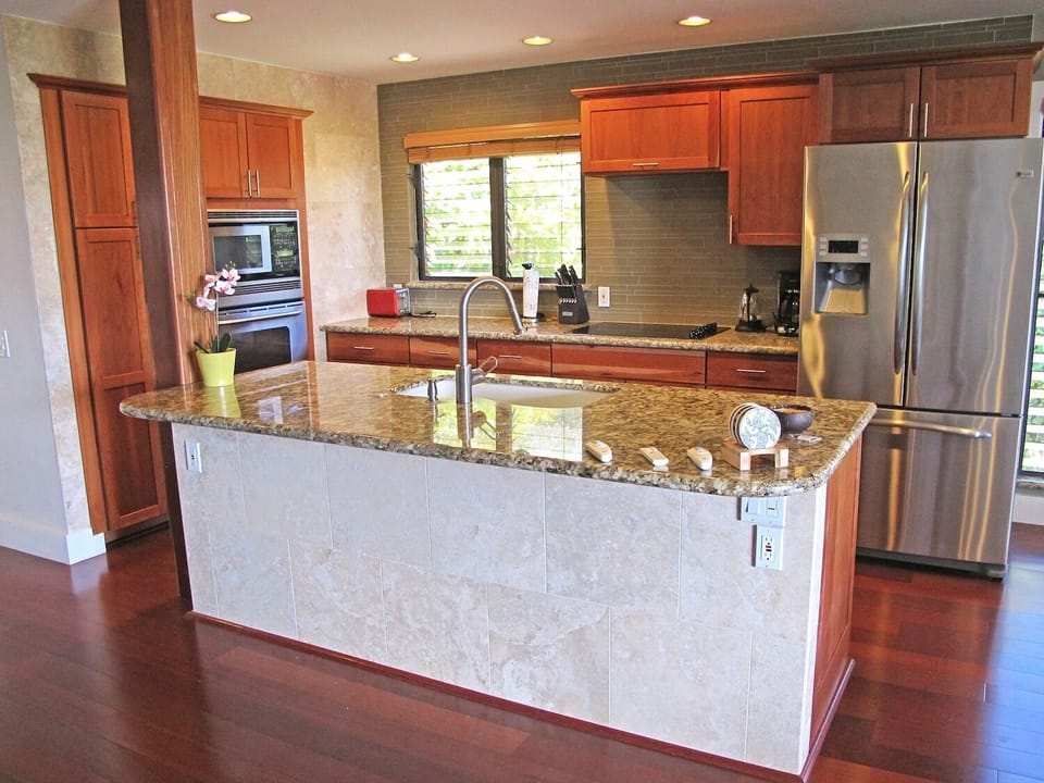 Gourmet Cherry Kitchen with Granite Counters and Center Island
