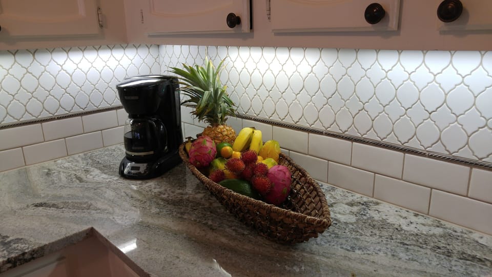 Custom Granite Counters and Tile Backsplash in Kitchen