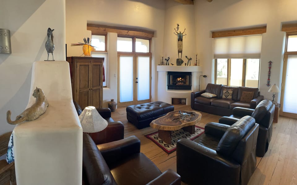 Worrell's "Ravens Fly Above Me" on a Laboradorite boulder in the great room