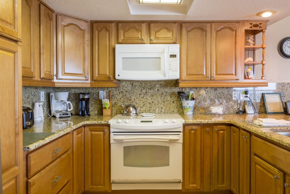 ANOTHER VIEW OF NEWLY REMODELED KITCHEN WITH PLENTY OF UTENSILS INCL. KEURIG.