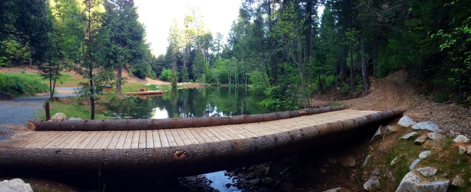 Main bridge over spring feed creek. Entire property & lake are for guests only!
