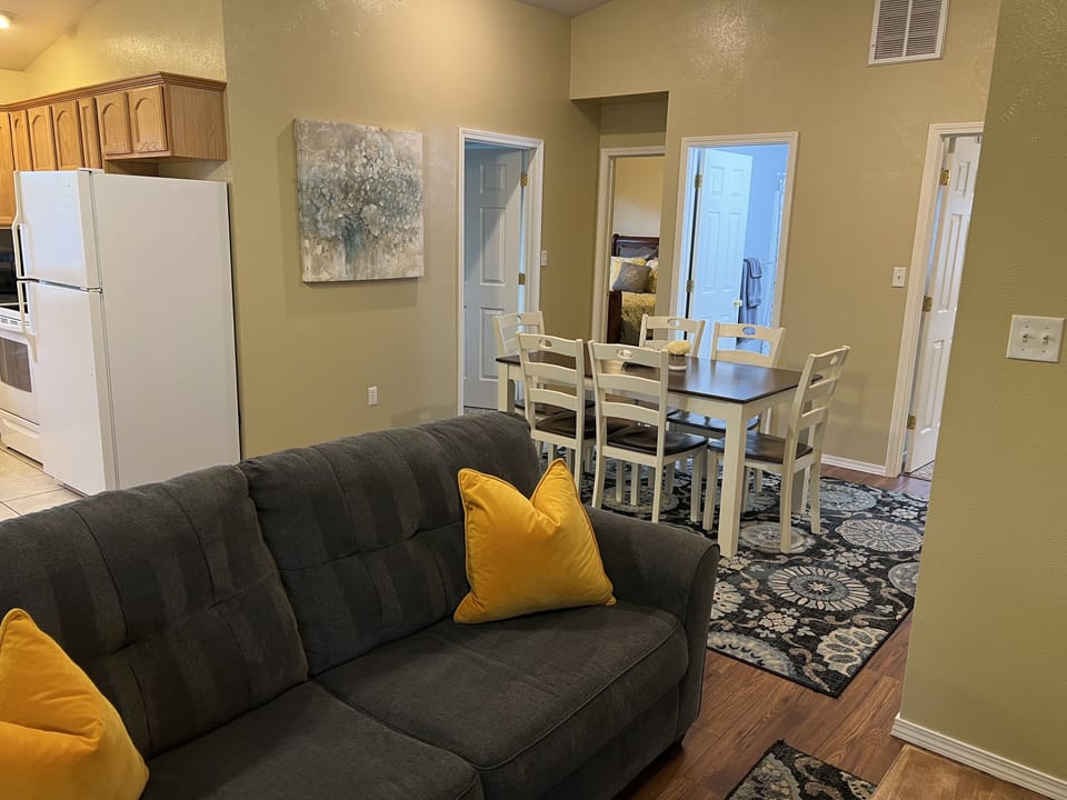 Standing in the living room area looking towards the dining area