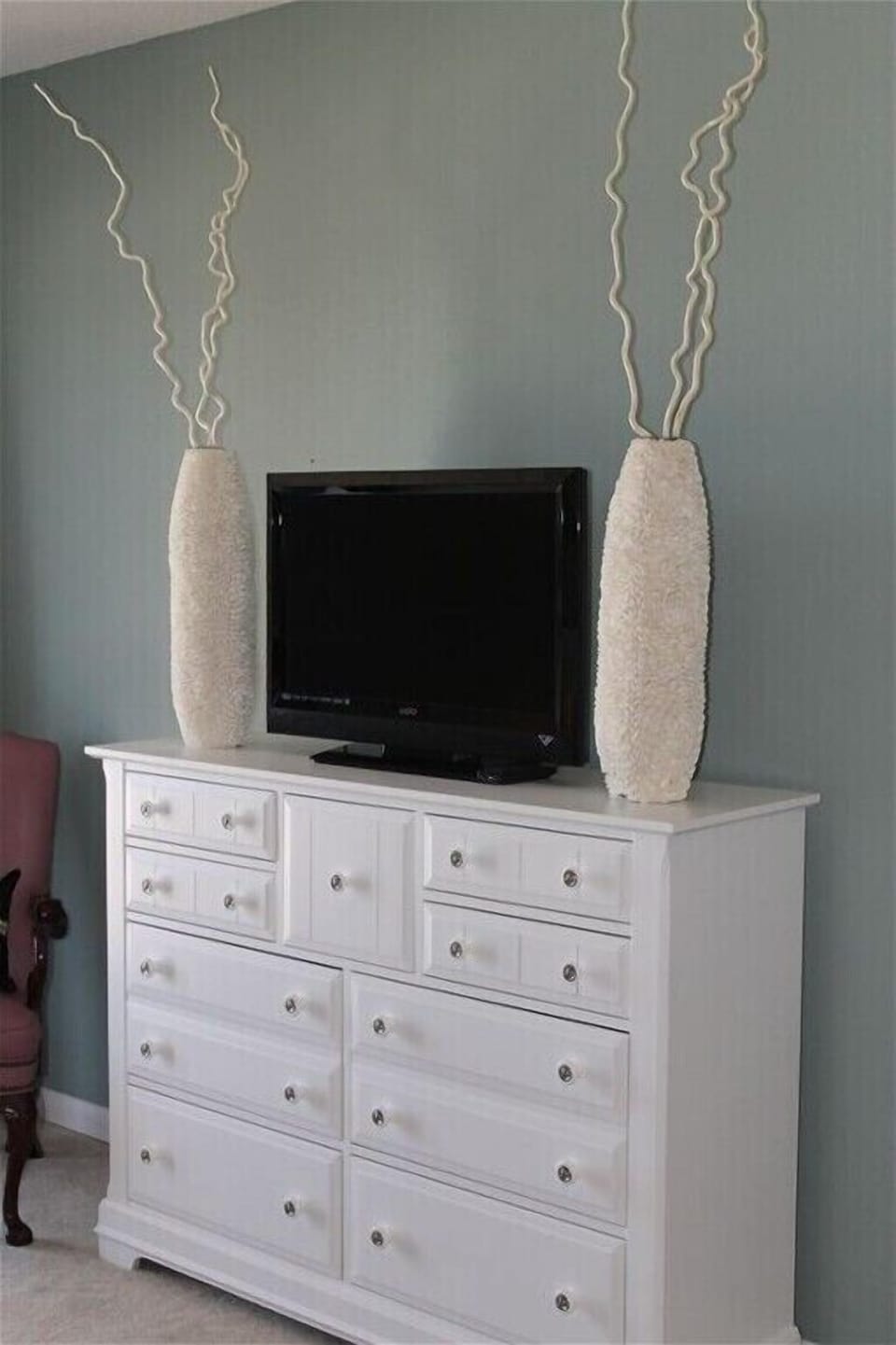 New TV with internet, new dresser, the vases are covered in shells, beautiful!