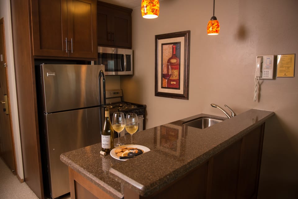 All new cabinets, quartz counter tops, and stainless steel appliances