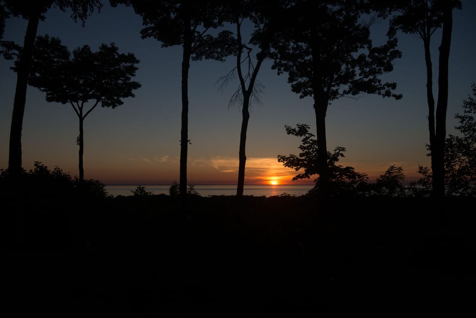 Here is a typical sunset from the porch to enjoy that wine and cheese with.