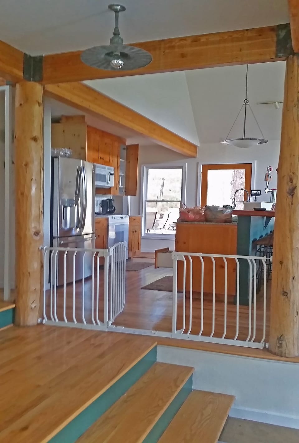 Optional toddler gate locks all steps out from little ones. GREAT Family House.