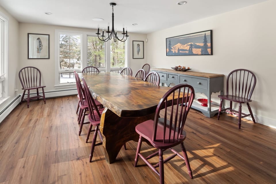 Spacious dining room with table for 12 (more seats at kitchen table & counter)