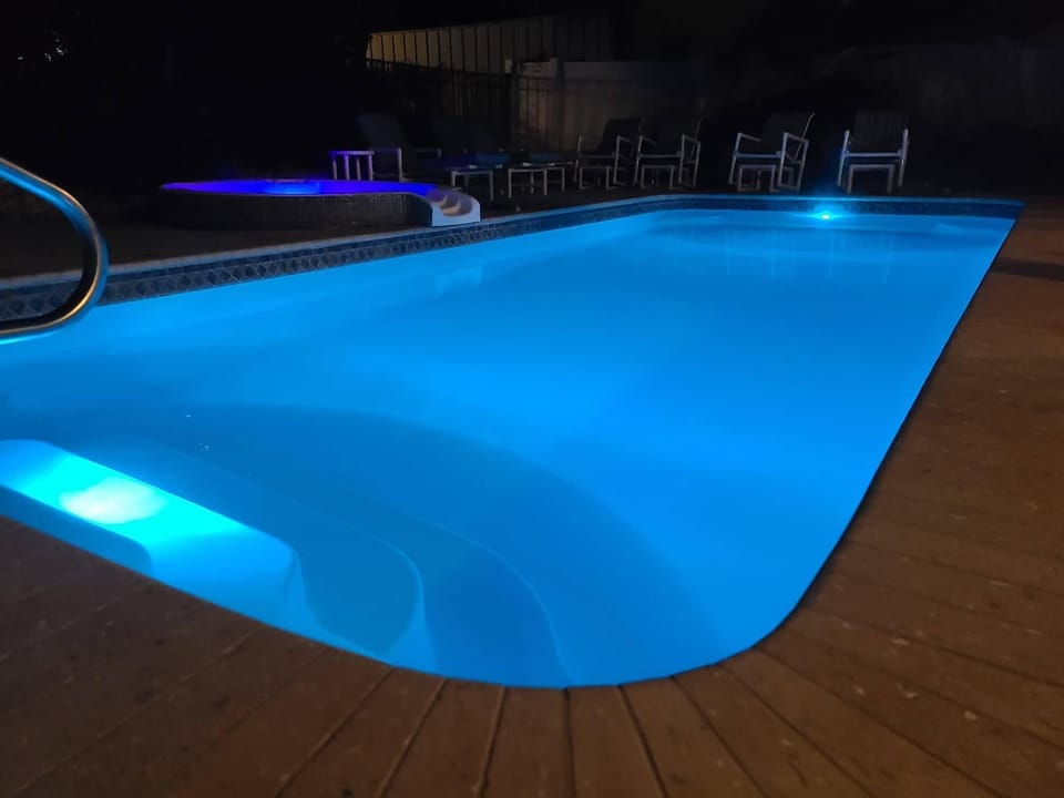 SALT WATER POOL AND SPA and Gas Heater:  The salt water pool has a smooth and silky feel to the touch, much like rain water and its gentle on your eyes and skin. We have a heater for the pool for the early spring and late fall. The Spa will reach 100+ degrees year around and the new GAS heater will heat the pool up to over 86 degrees. The 12x28 pool is flat bottomed so the kids...