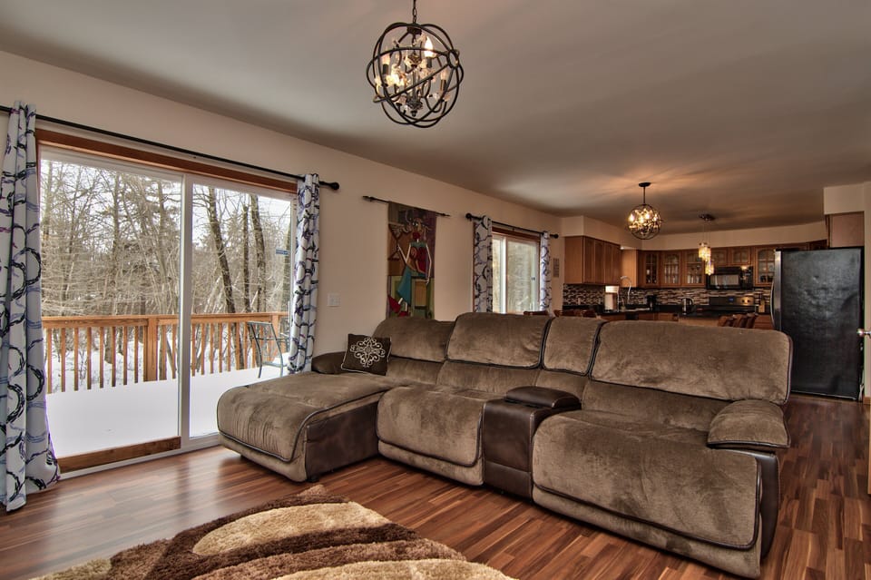 Open floor layout w/ dining room, kitchen, fireplace room, and game room 