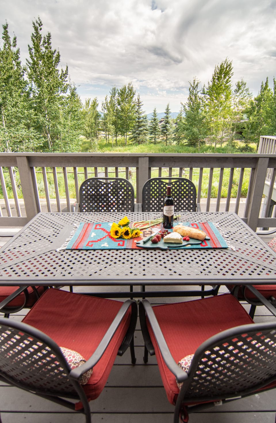 Large deck with large gas grill for grilling or relaxing.