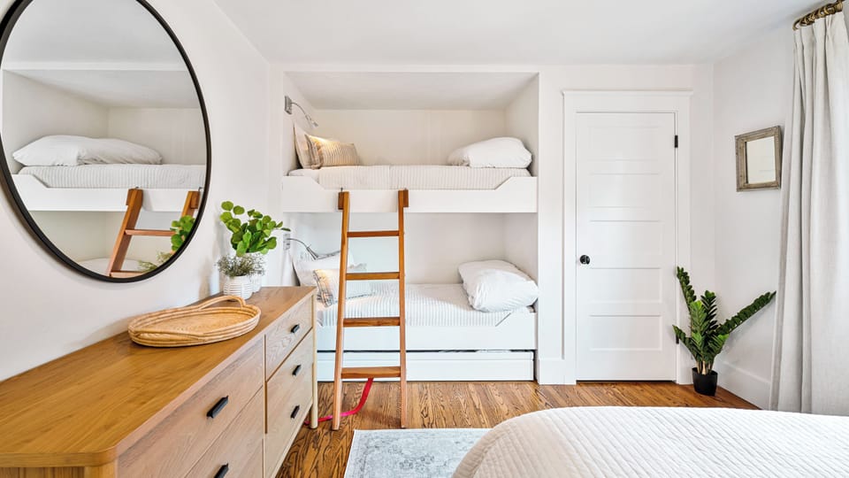 Bunk Room with queen, two bunks and twin trundle beds. 