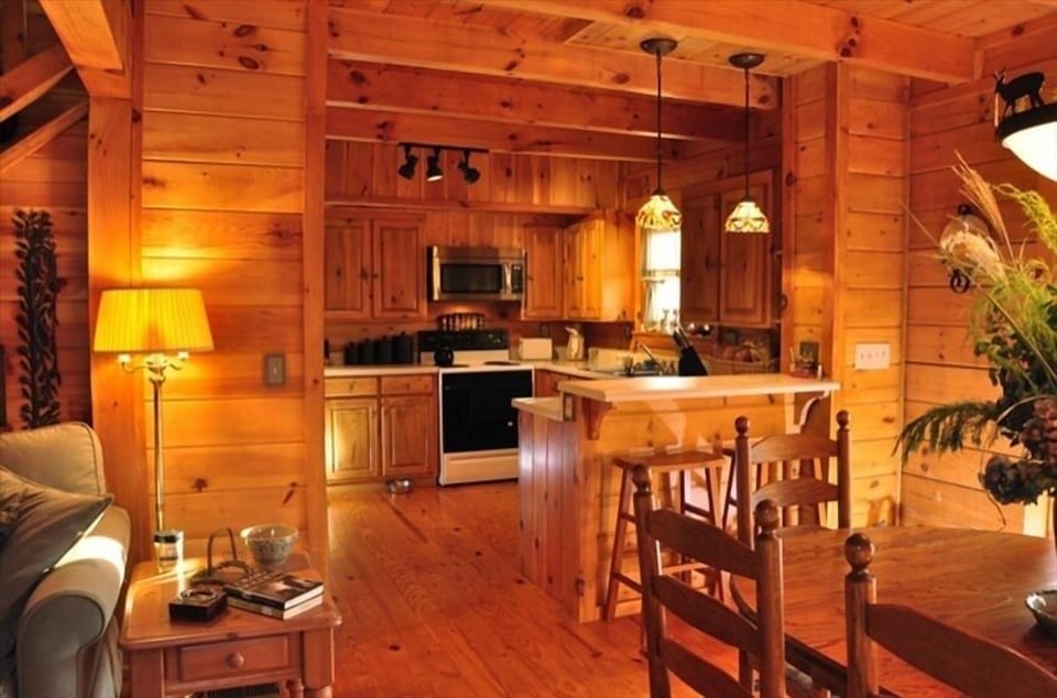 Spacious kitchen opens to eat-in counter and informal dining room.