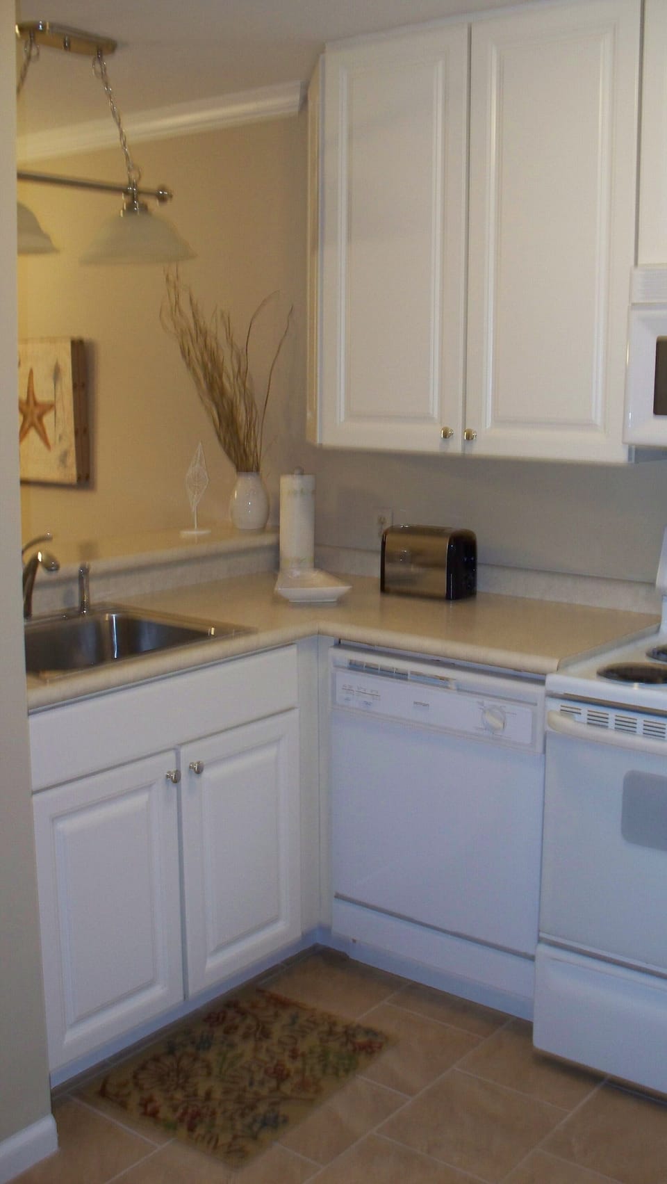 The Kitchen has full size appliances and all cooking Utensils