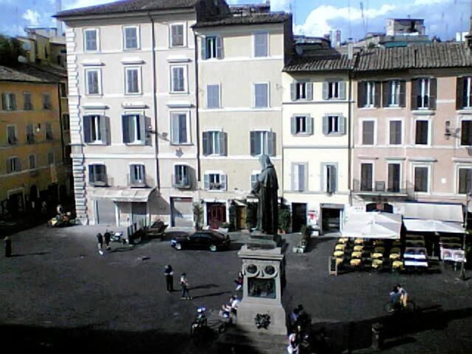 view from the living room on Campo de fiori statue Giordano Bruno