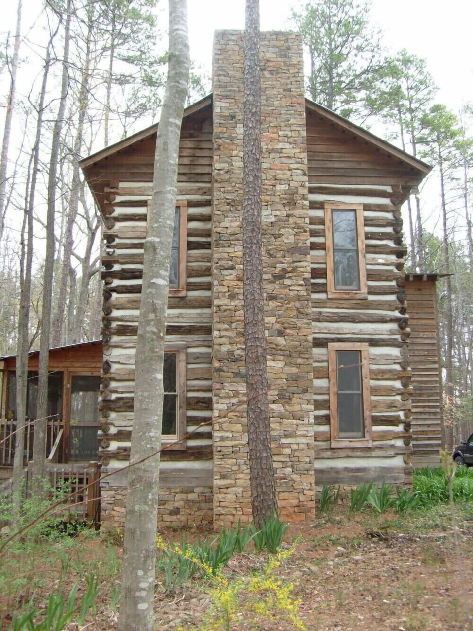 side view with stacked stone chimney