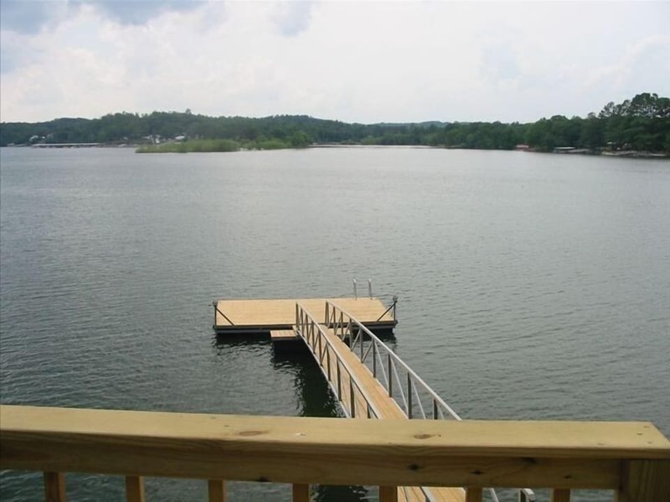 Swim platform deck with boat cleats.