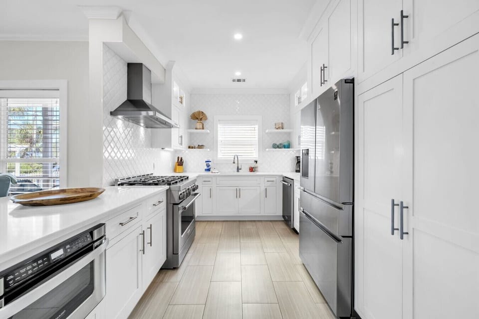 Updated and well stocked kitchen is open to the living area.