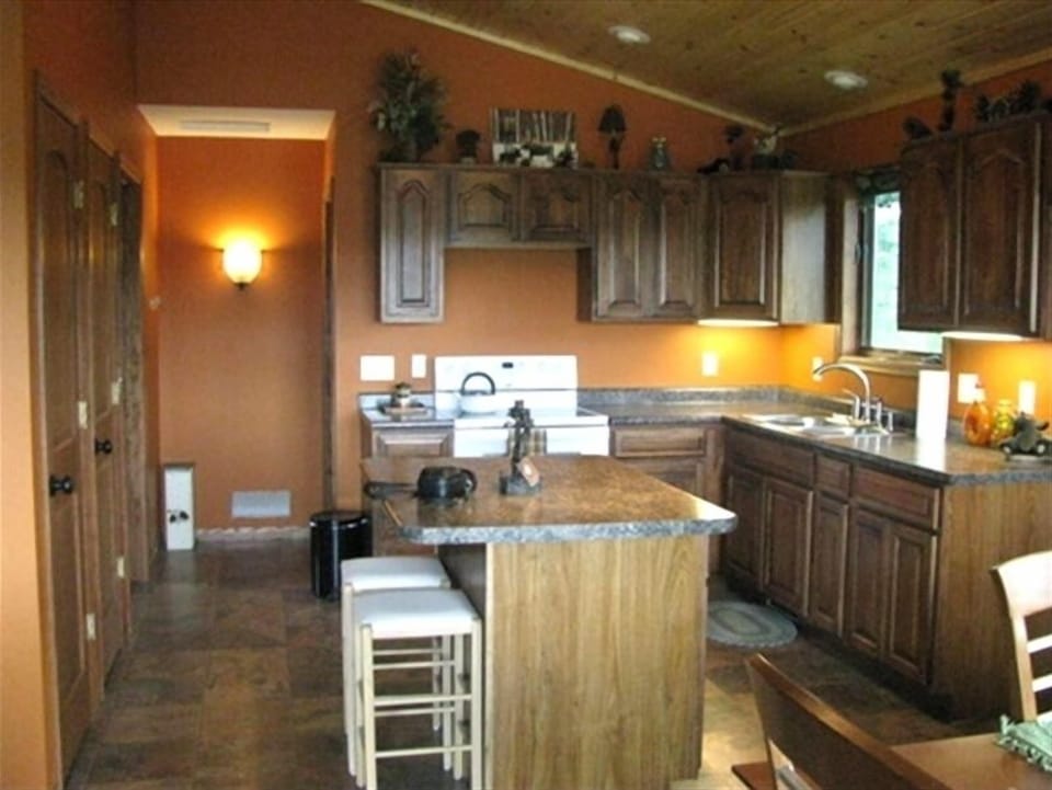 kitchen and hallway to master bedroom and full bath with washer/dryer.