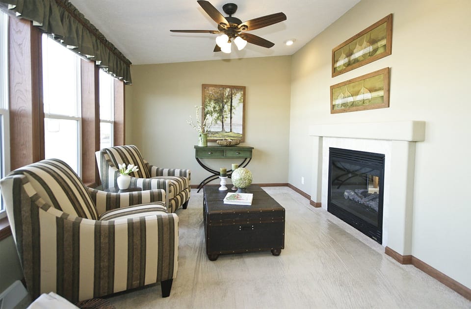 Sunroom overlooking the lake with double fireplace