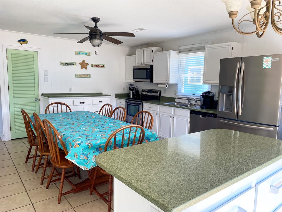 Fully stocked, large eat in kitchen