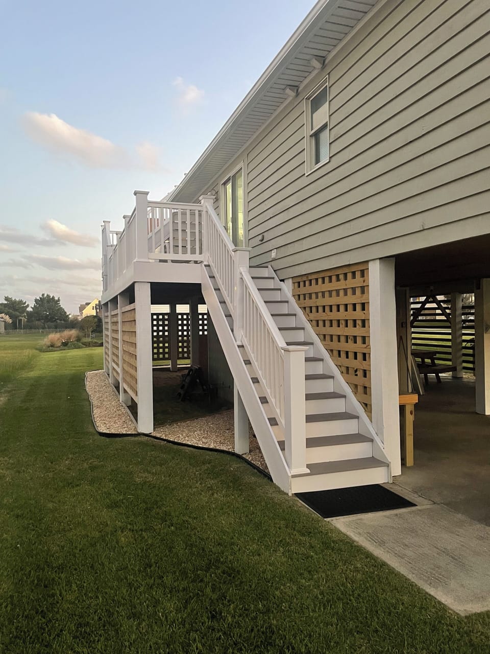 Staircase to deck on Ocean side of cottage