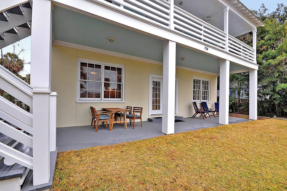 The front porch is shady, and because the house sits on a natural sand-dune, you get an ocean breeze as well.