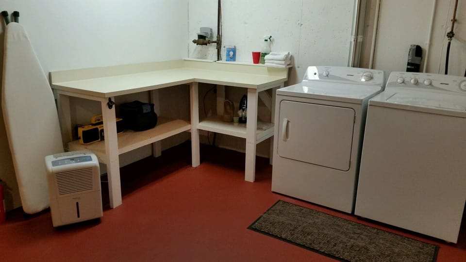 Complete laundry facility in lower level.