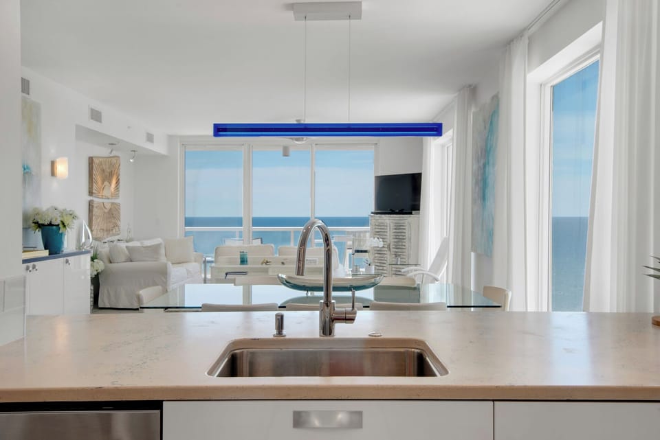Kitchen overlooking dining room and living room