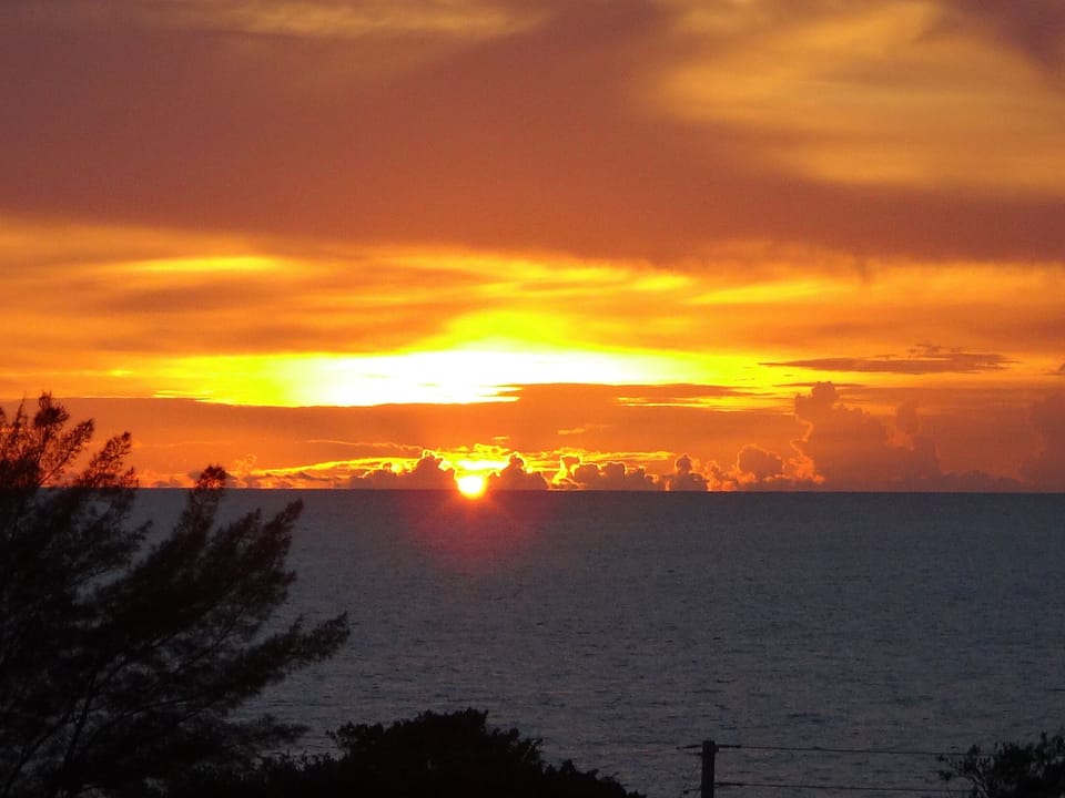 Beautiful sunset over the Gulf of Mexico as seen from the rooftop sun deck