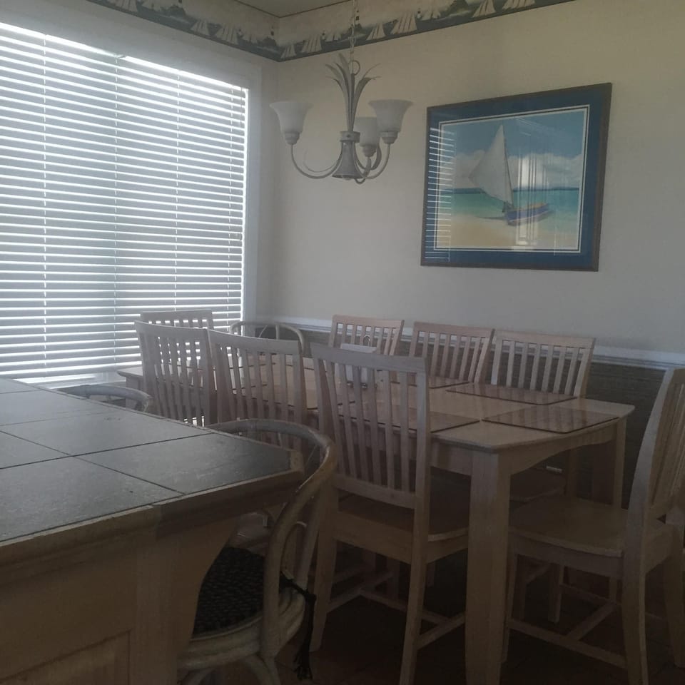Dining Area - table for 8 plus 3 bar stools 
