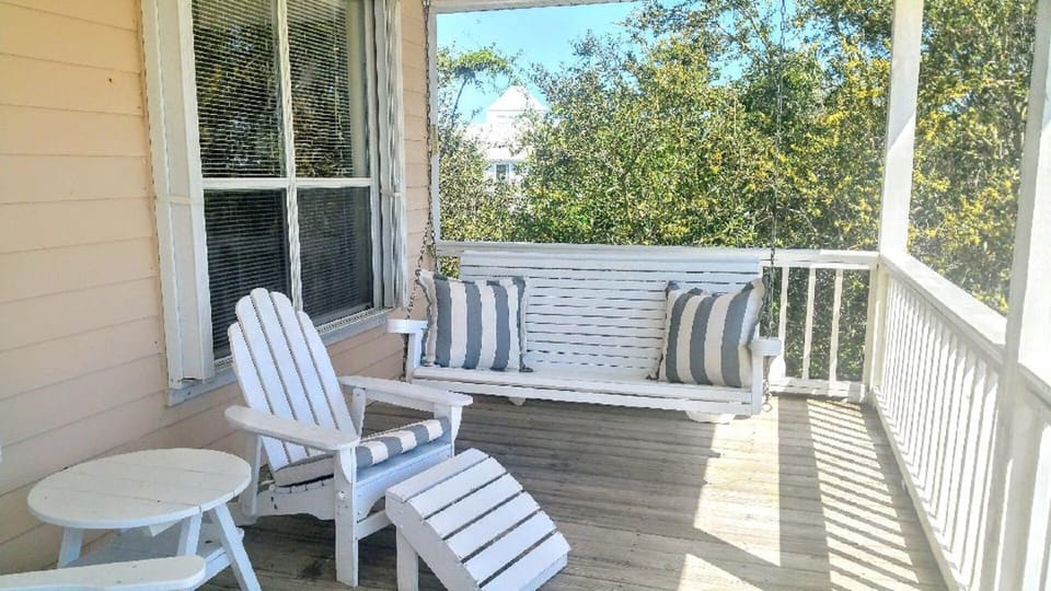 Front porch swing looking north toward pool.