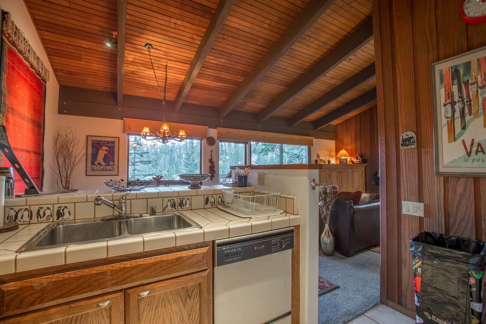 Kitchen access to all the  fun going on in the family room dining areas.