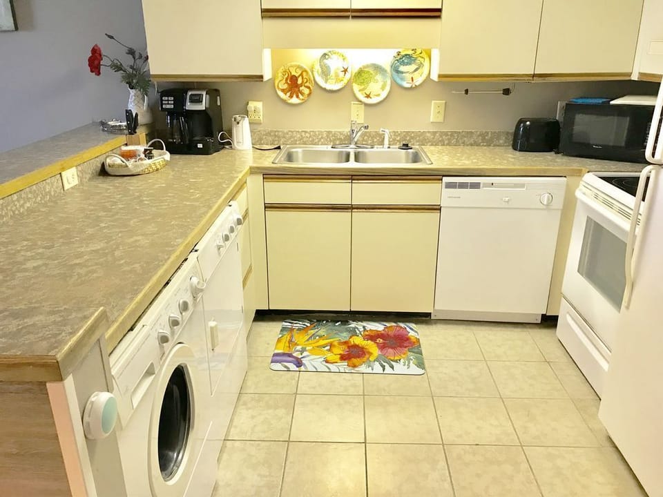 The kitchen in 504 includes a Flex brew  machine for a whole pot, single or Kcup
