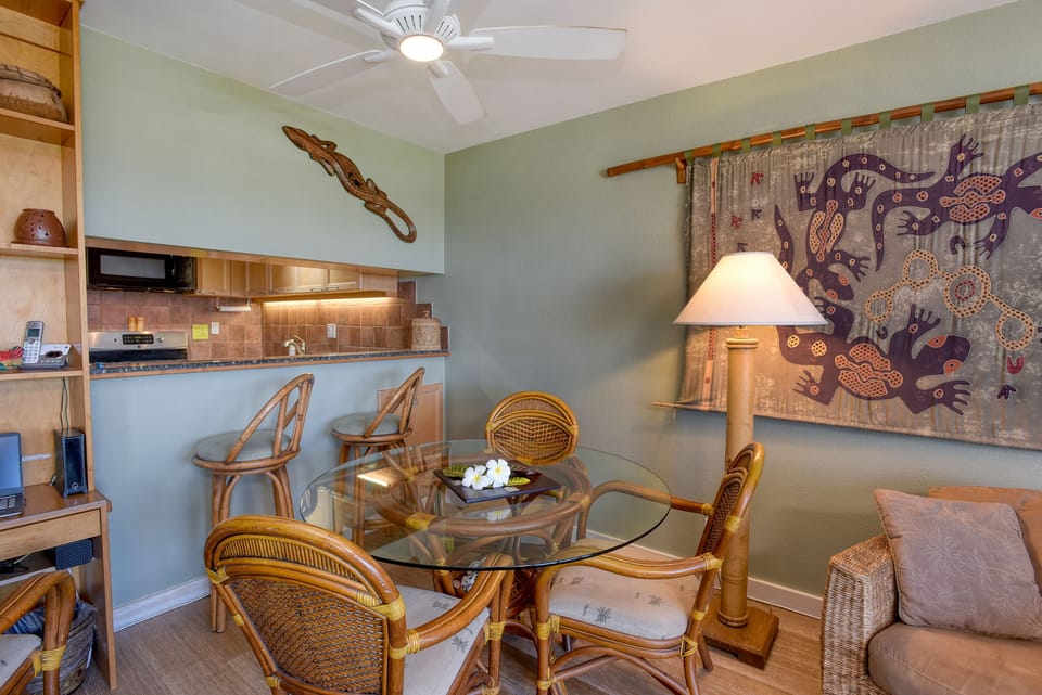 Dining area for four, plus barstools allow the cook to be included in the party