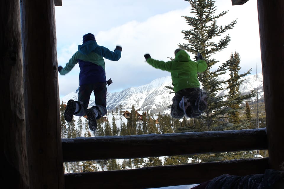 Enjoying a leap off the patio railing into the snow!!
