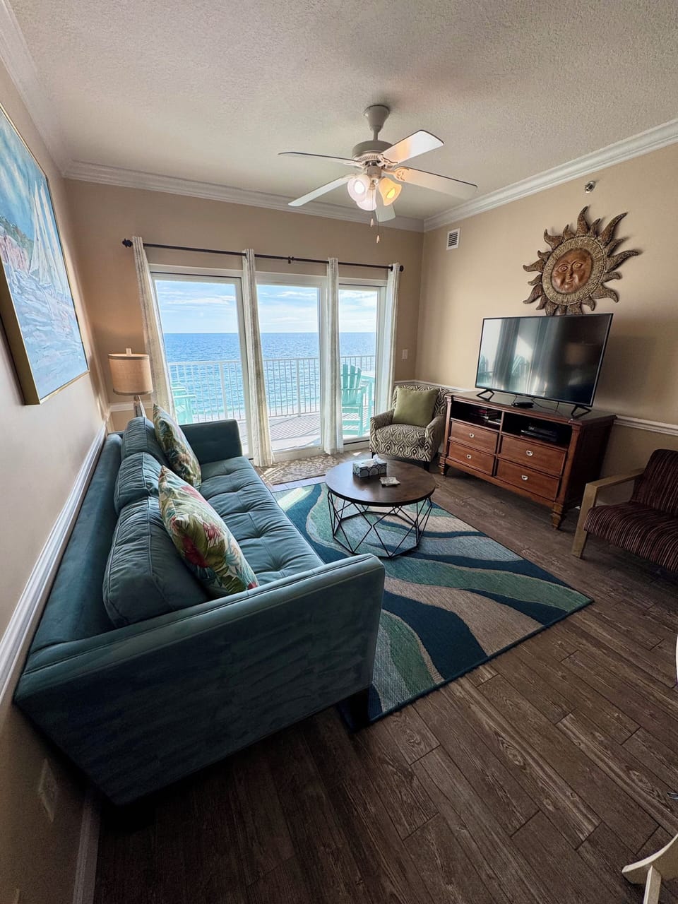 Living room with sliding glass door to balcony