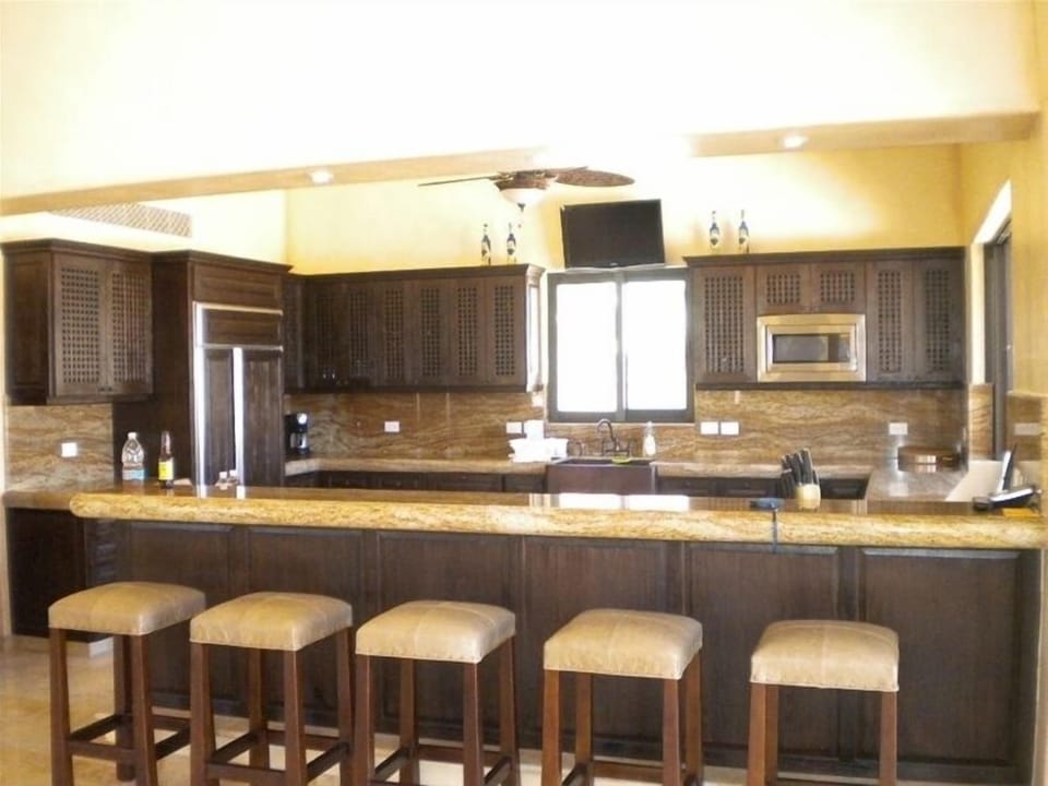Large gormet kitchen with indoor & outdoor counter seating for 9