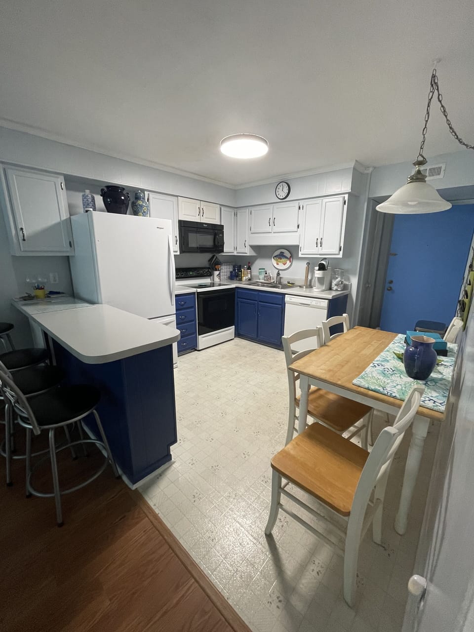 Kitchen...bar with 4 stools and table