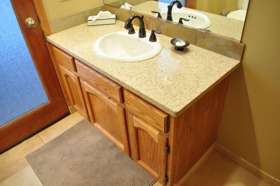 Master Bathroom with Quartz Slab Countertop