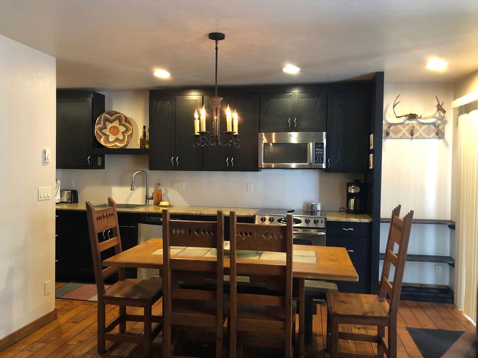 Dining Room/Kitchen Fully Stocked with Glassware, dishes, cookware, much more.