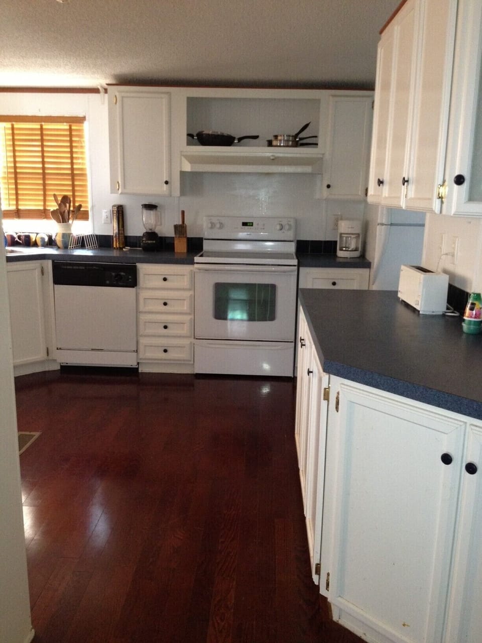 kitchen with everything you will need, from a pizza cutter, to toaster.