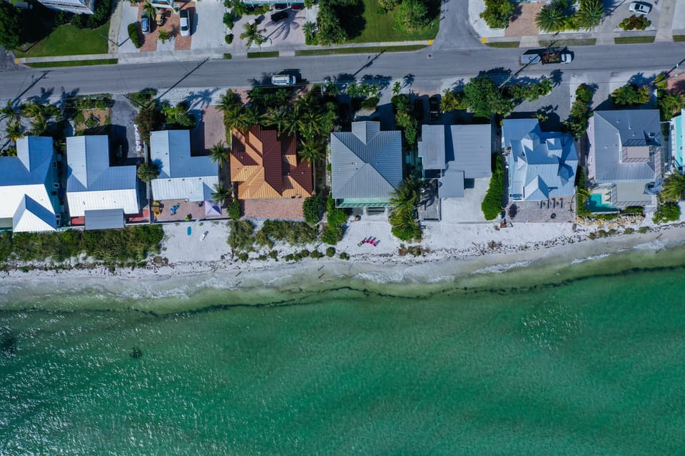 Beachhouse is just to the right of the brown roof